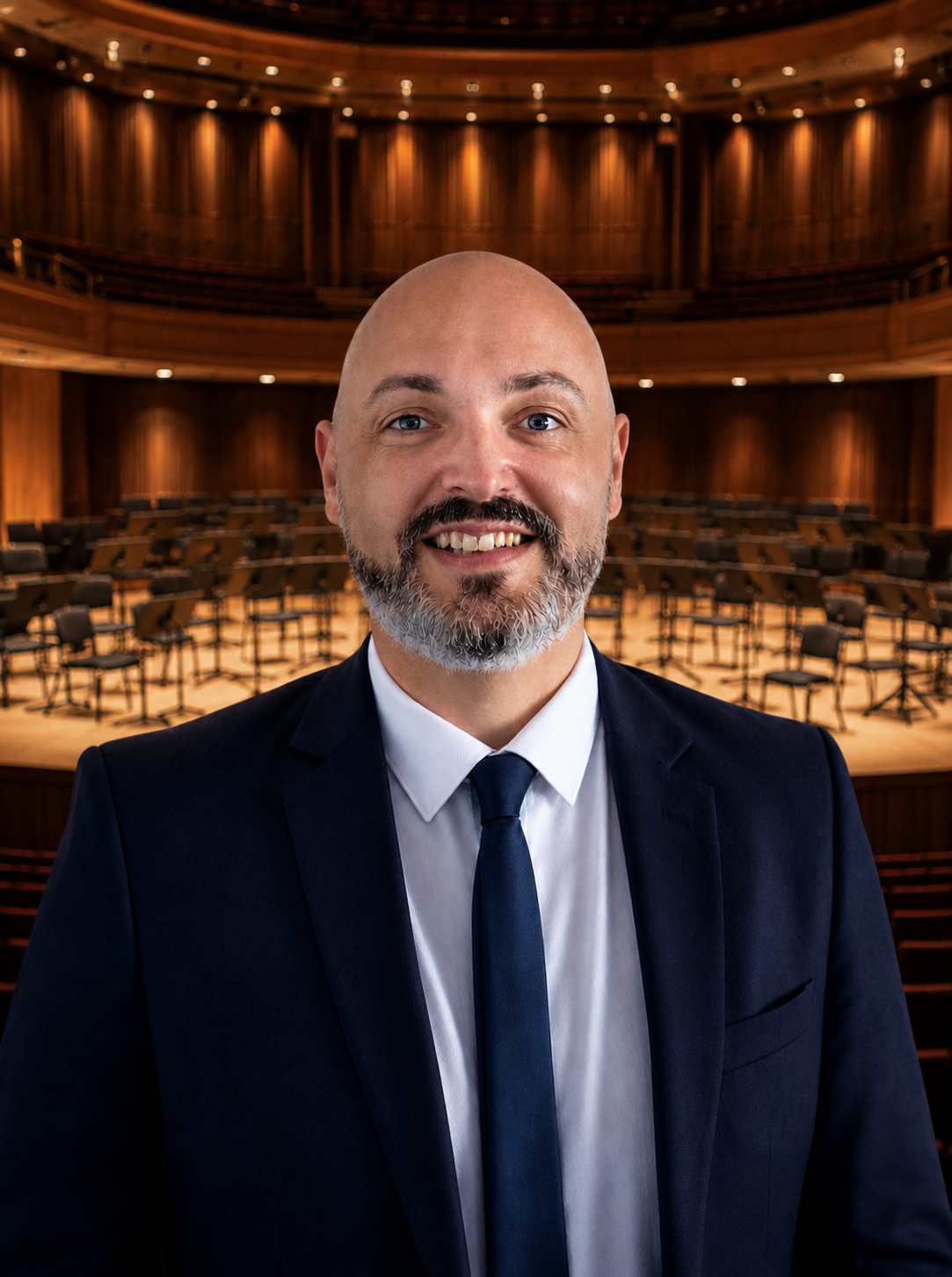 Portrait d’Éric Darrigrand dans un auditorium